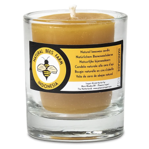 vela de cera de abeja en vaso de vidrio